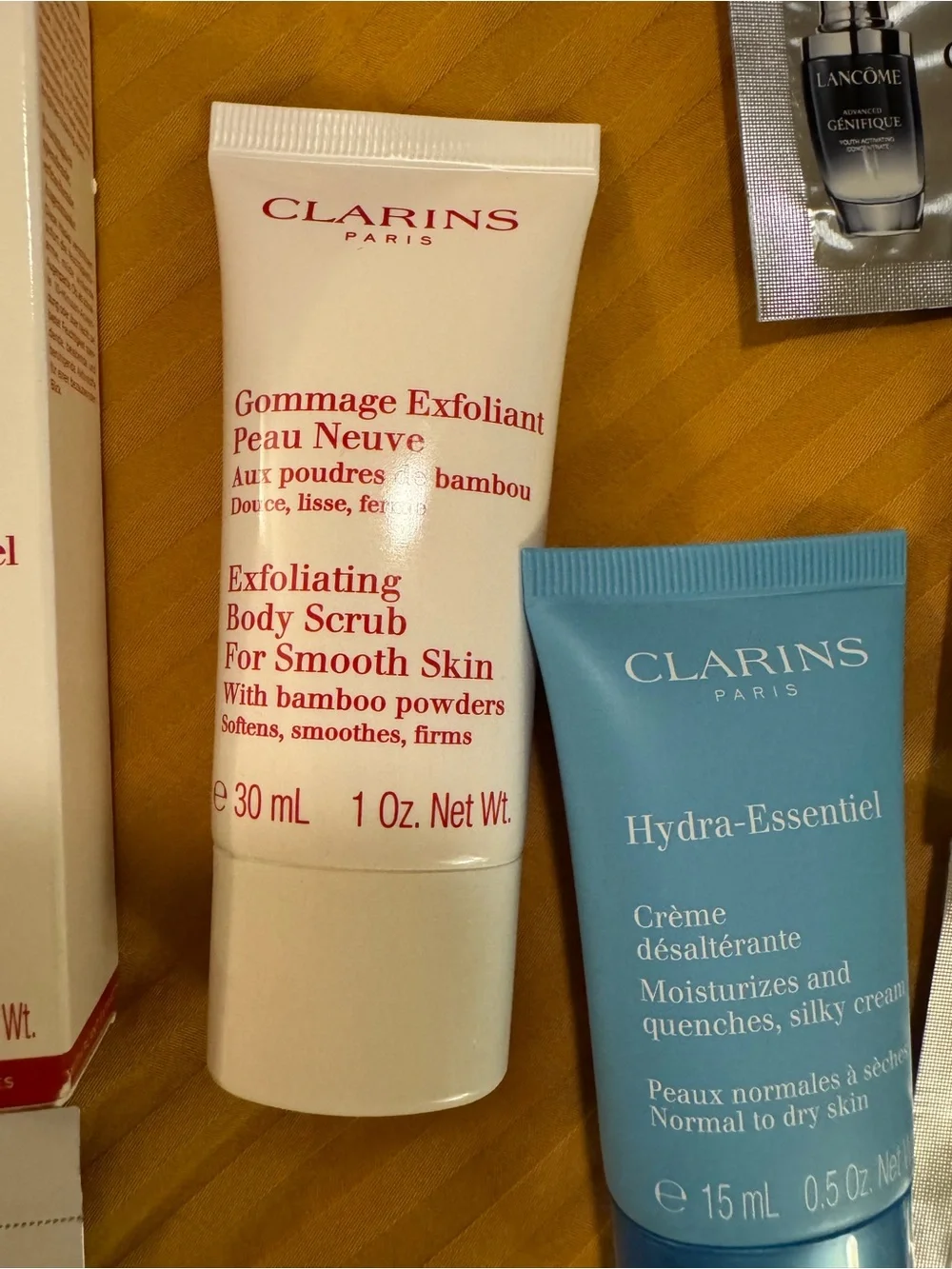 Clarins Pouch with Clarins and other product samples